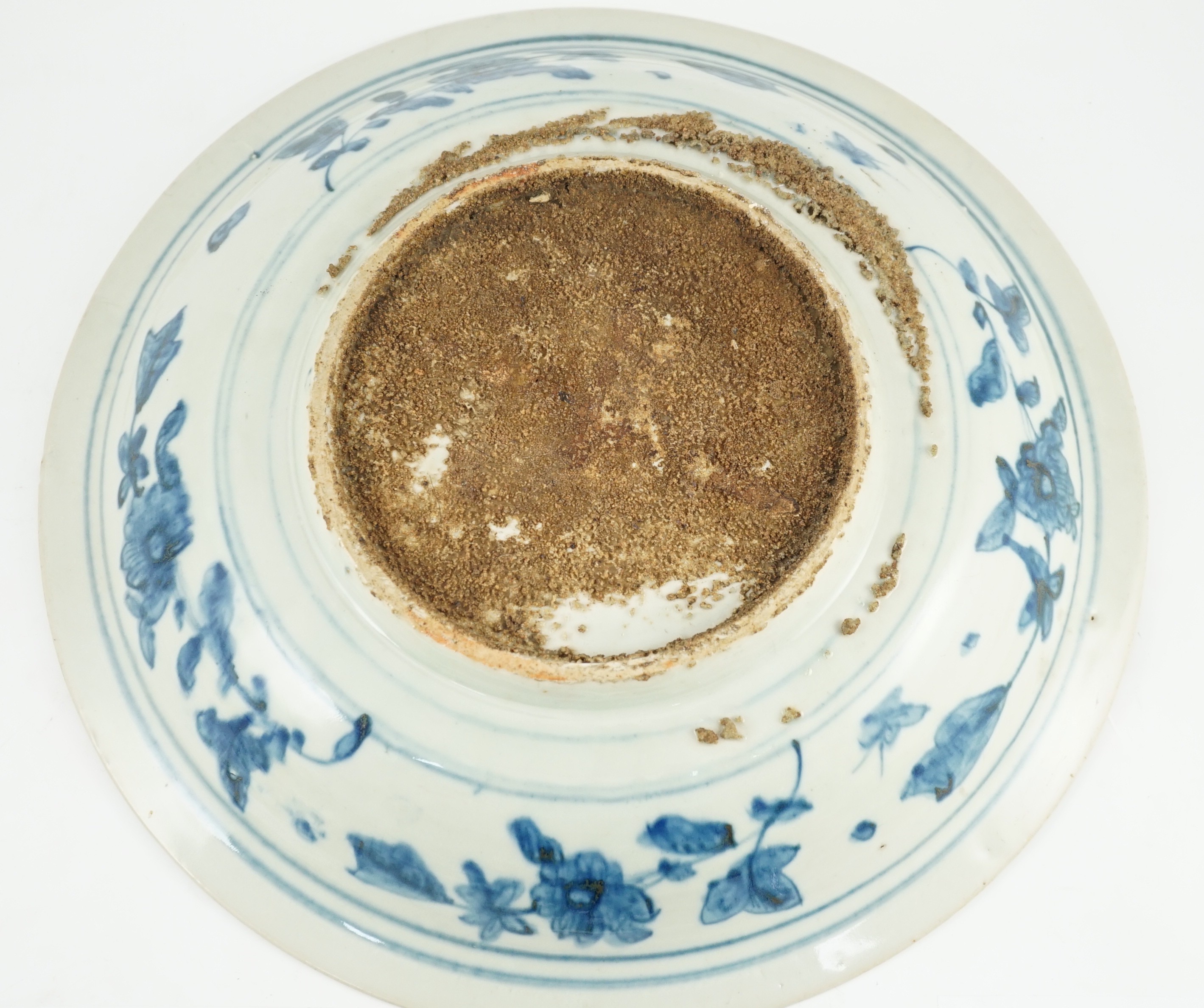 A large Chinese Swatow blue and white ‘Shou Lao’ dish, Zhangzhou kilns, Wanli period, 43.4cm diameter, tiny rim chip